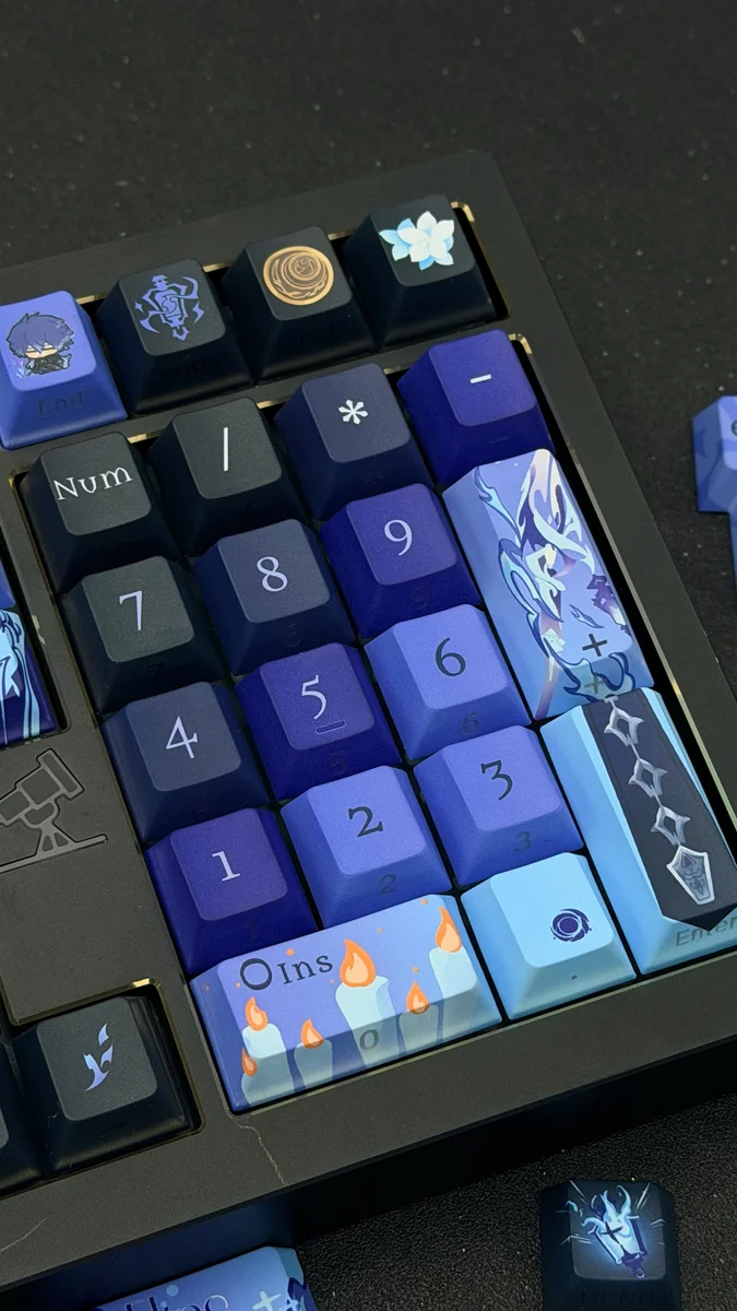 Close-up of the exclusive Genshin Impact Flins side-legend keycap set, showcasing its vibrant anime character art and sleek minimalist design from a unique design.