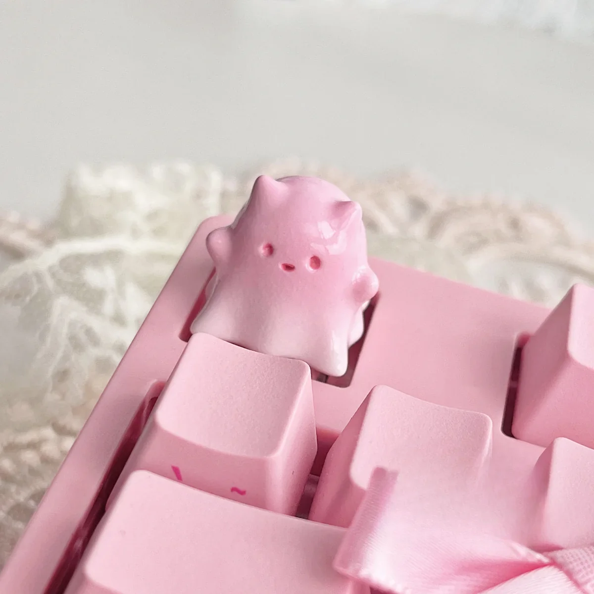 Whimsical hand-painted ghost cat keycap art, translucent pastel resin details from various angles, showcasing its unique and ethereal design.