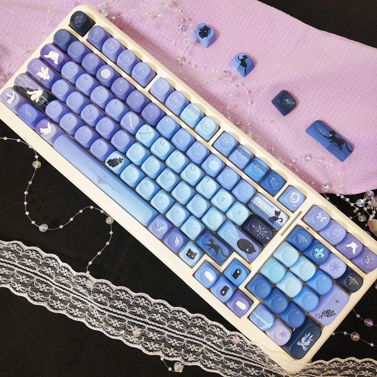 Detailed views of the premium Ghost Cat Moon Rabbit PBT keycaps set, featuring enchanting black and purple mystical artistry with lunar cat and rabbit design.