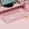 A playful arrangement of the Adorable Greedy Pig PBT keycap set, featuring vibrant, food-inspired dye-sub cartoon characters.