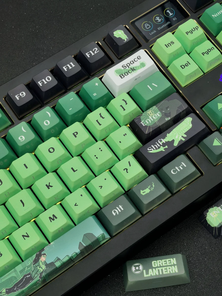 Exclusive DC Green Lantern side-engraved keycaps set in vibrant green and black, showcasing the iconic insignia from multiple artistic angles.