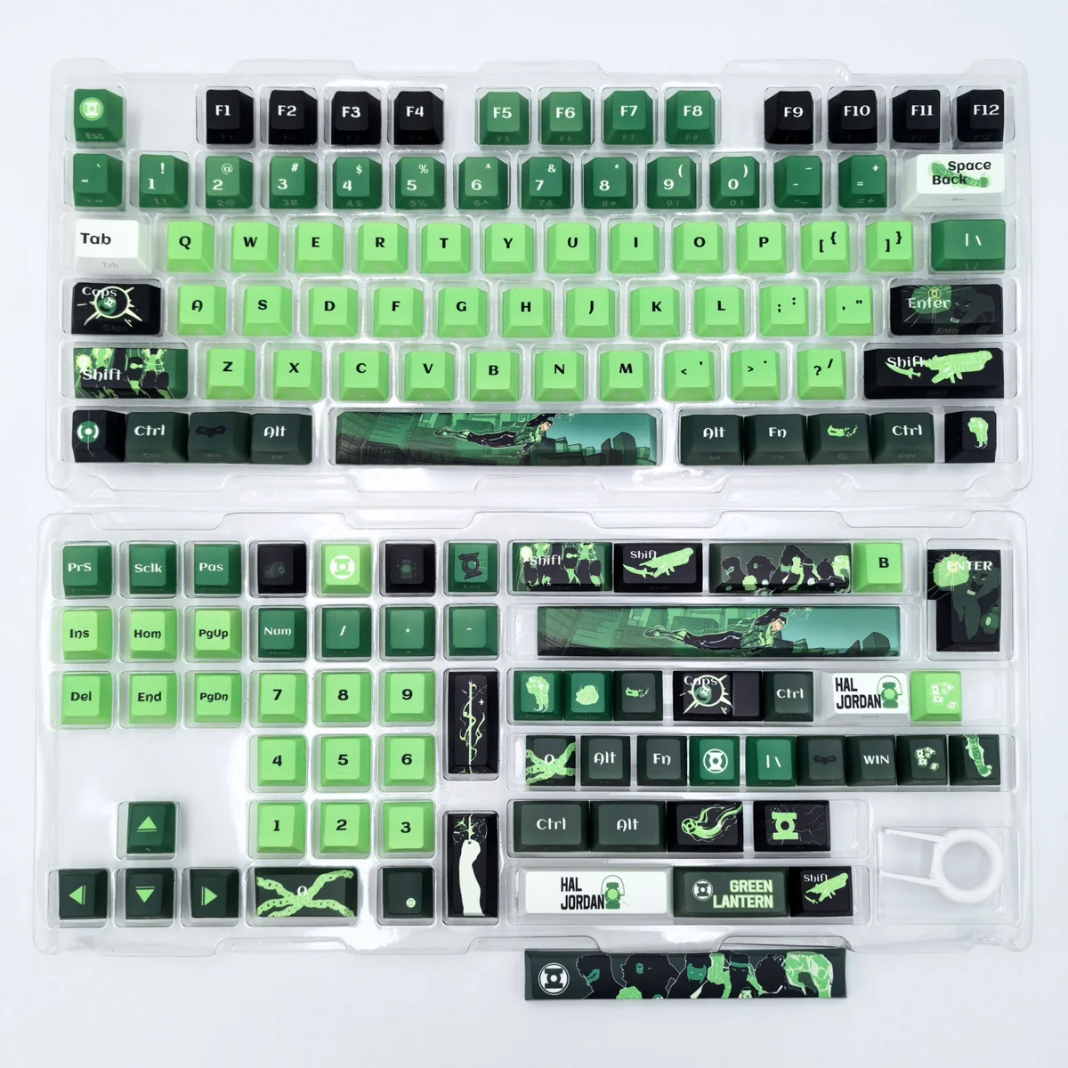 An artistic view of the exclusive DC Green Lantern side-engraved keycaps set, highlighting the iconic insignia in vibrant green and black from various angles.