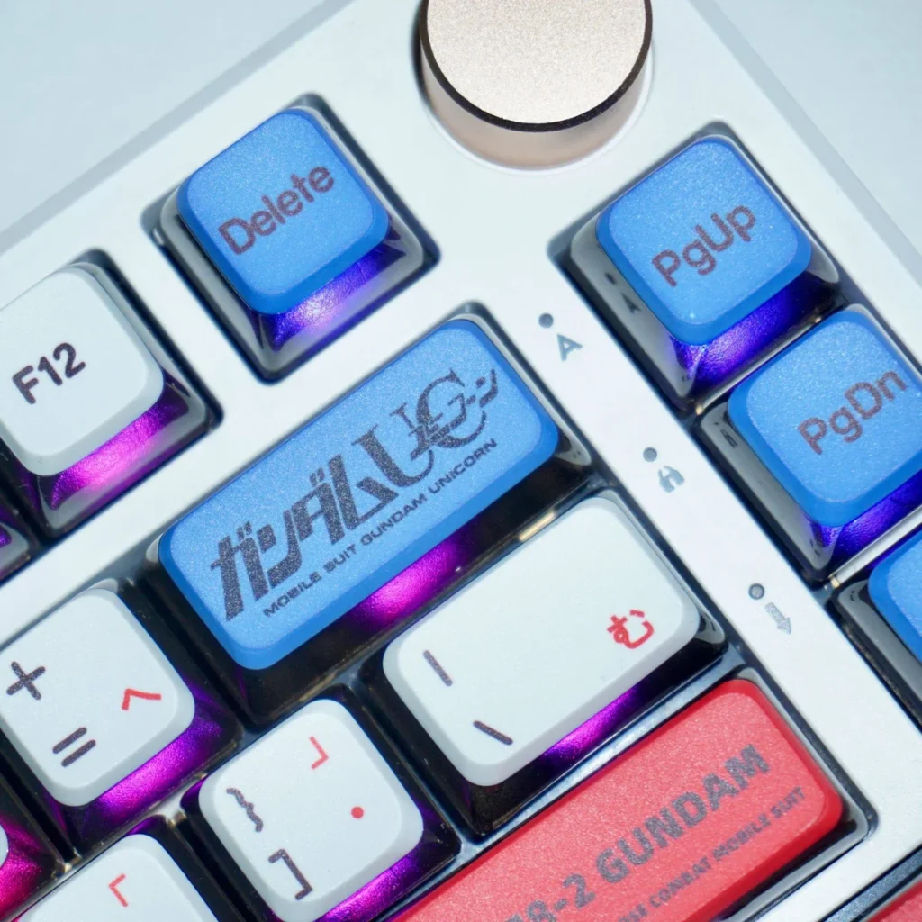 Dynamic gallery of the iconic Gundam Mecha Translucent Japanese Keycap Set, shown from various angles. Highlights its unique translucent design.