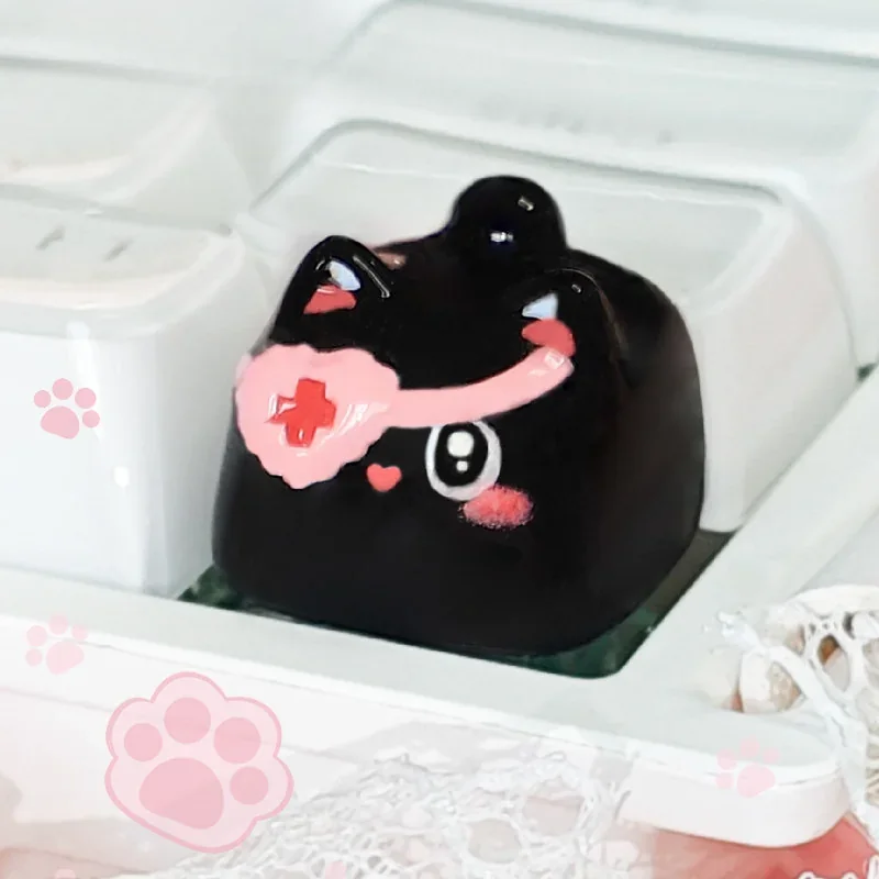 A collection of handcrafted 3D cat keycaps, featuring adorable sculptural cats playfully stacked from various angles, adding whimsical charm to your design.