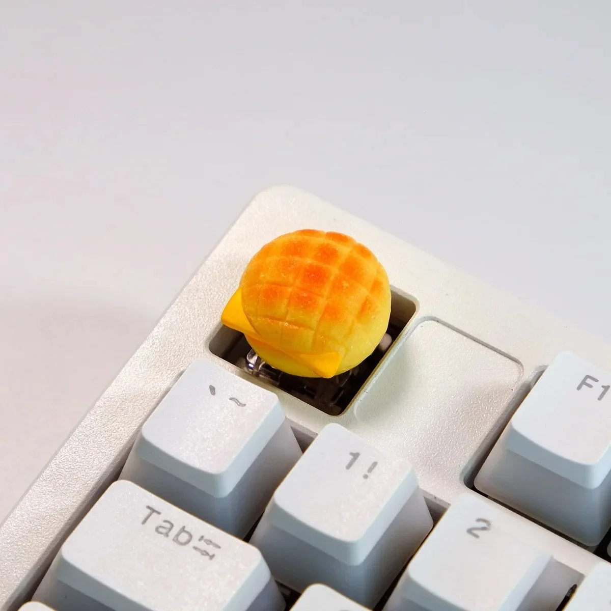Whimsical handcrafted artisan keycaps, a gallery of delectable miniature baked desserts. Multiple angles showcase their intricate details and premium design.