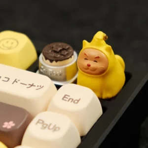 A whimsical handcrafted Twinkle Twinkle Cat & Bowl Keycaps, brightly colored and intricately designed, offering a unique artisan cat keycap for keyboards.