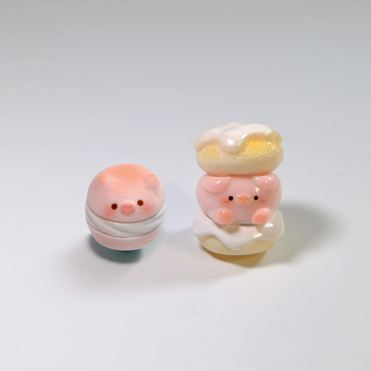 Adorable 3D handmade pig keycap from various angles, highlighting its whimsical sculpted piggy character, pastel colors, and sweet dessert design.