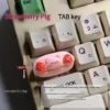 Adorable handmade 3D piggy keycaps, showcasing various angles of whimsical, dessert-inspired pastel pig characters. These custom keycaps are charming.