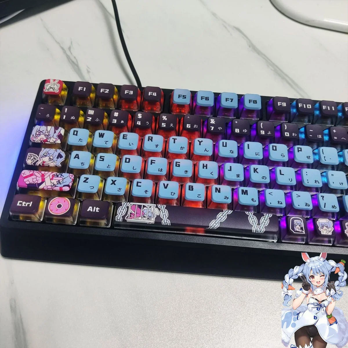 Close-up of Hatsune Miku Rabbit Hole translucent keycaps set, revealing their vibrant anime-inspired details and ethereal glow from various angles.