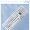 Close-up views of the minimalist pure white Heart PBT Keycap Set, highlighting its durable PBT material and elegant heart motif from multiple angles.