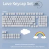 Close-up of a minimalist pure white PBT heart keycap set, highlighting its durable texture and subtle, elegant design for a sophisticated keyboard.