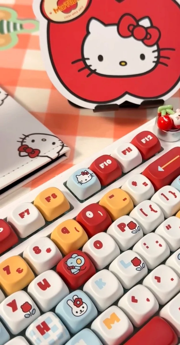 Playful Hello Kitty MOA profile keycap set photos, displaying iconic character art, smooth pastel aesthetic, and its unique shape from different angles.