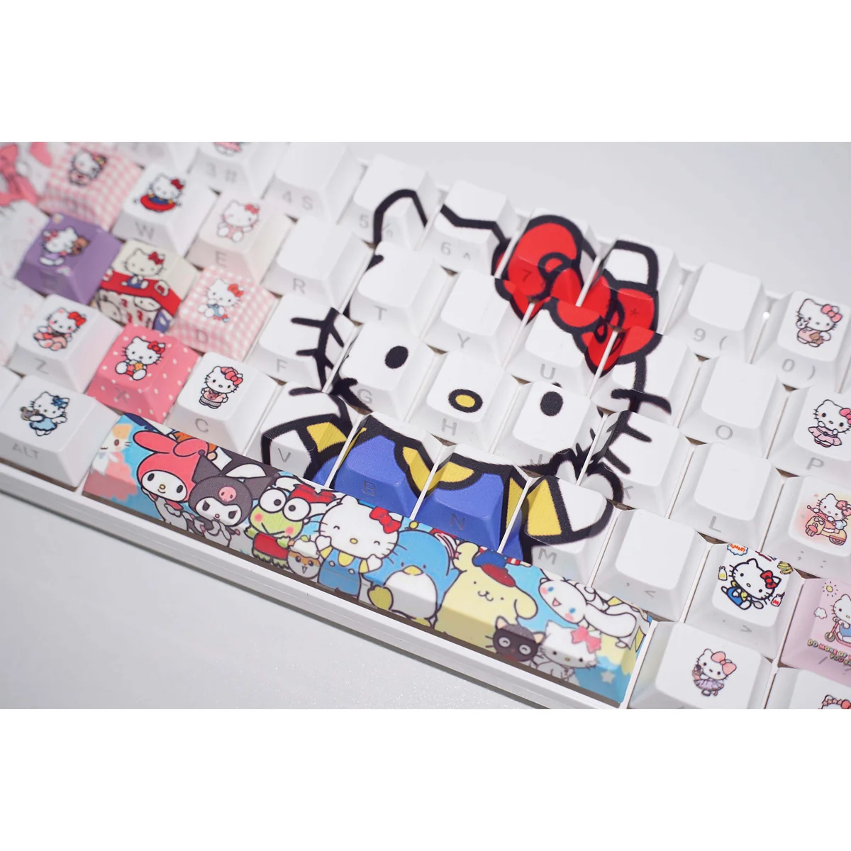 Charming Hello Kitty side-engraved backlit keycaps set showcased from multiple playful angles, highlighting the vibrant RGB glow and subtle legends.