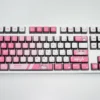 Detailed view of vibrant Bocchi the Rock keycaps set, showcasing playful anime character art and the stunning four-sided backlit glow.