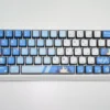 Vibrant Bocchi the Rock backlit keycaps set from a unique angle, revealing the detailed anime art and brilliant four-sided glow, perfect for keyboard enthusiasts.
