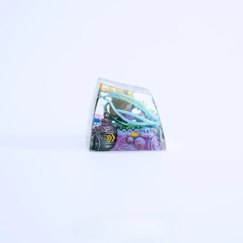 Intricately hand-painted Sherma translucent artisan Hollow Knight keycap, glowing with its unique profile from various angles.
