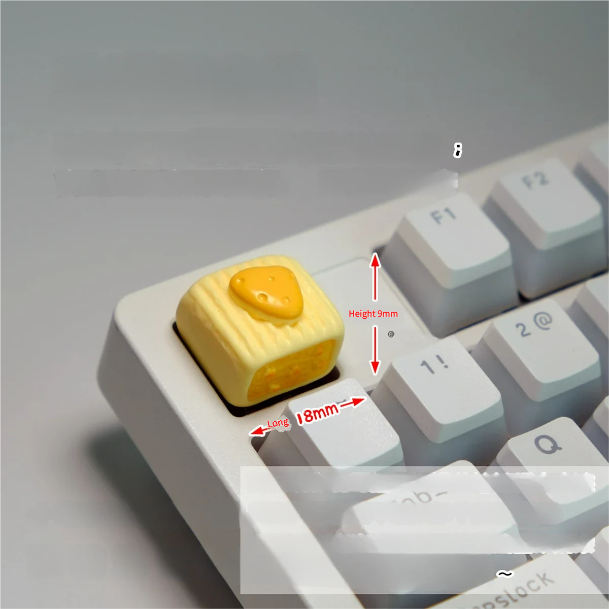 Whimsical Ice Cream Cake Keycaps: a delightful, handcrafted resin miniature square cheese pastry, adding a charming, edible aesthetic to MX keyboards.