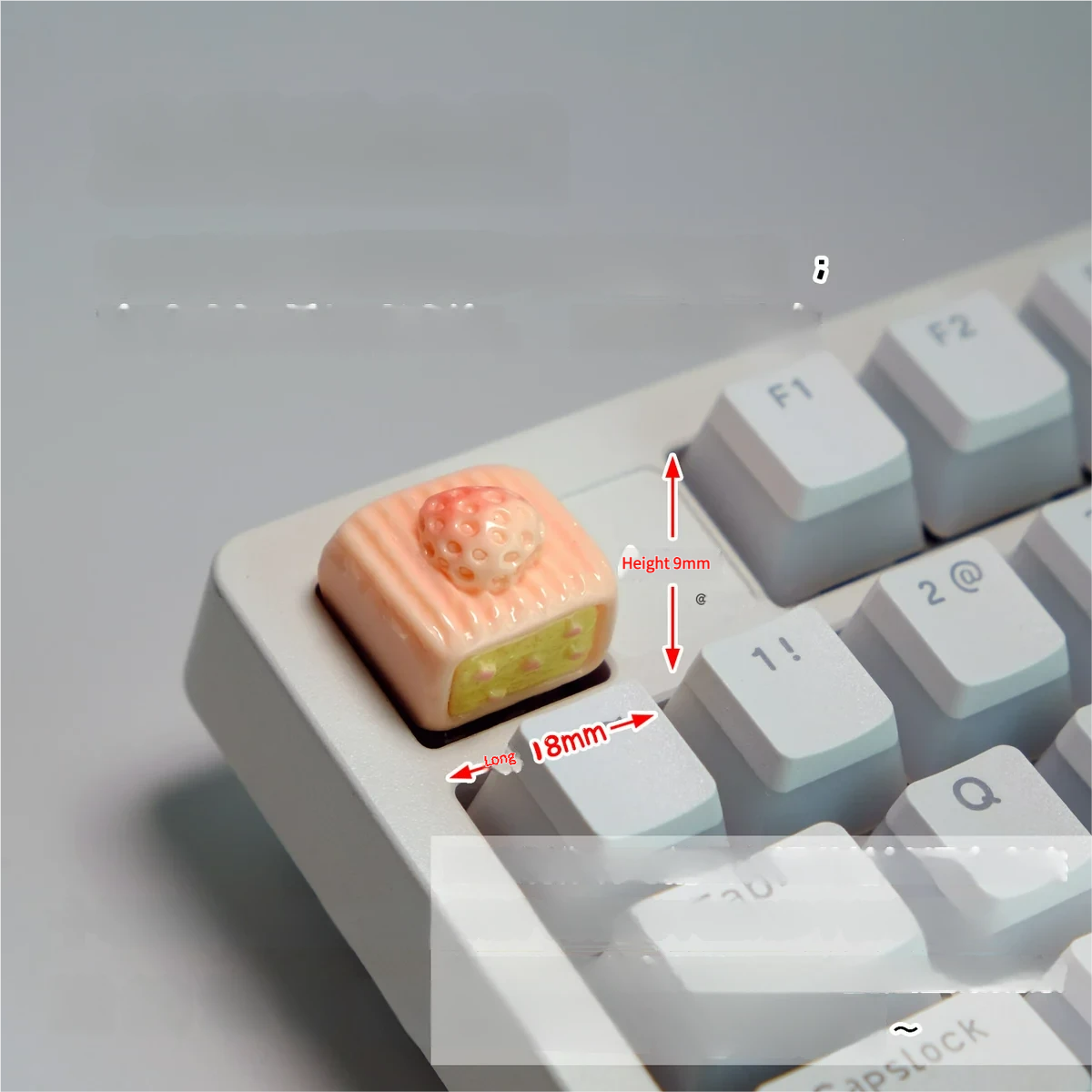 Whimsical handcrafted Ice Cream Cake Keycaps featuring a vibrant miniature strawberry square cake design for MX mechanical keyboards.