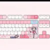 Close-up views of the exclusive Jigokudani Sara PBT backlit keycap set, showcasing its vibrant anime girlfriend art and smooth PBT texture from various angles.