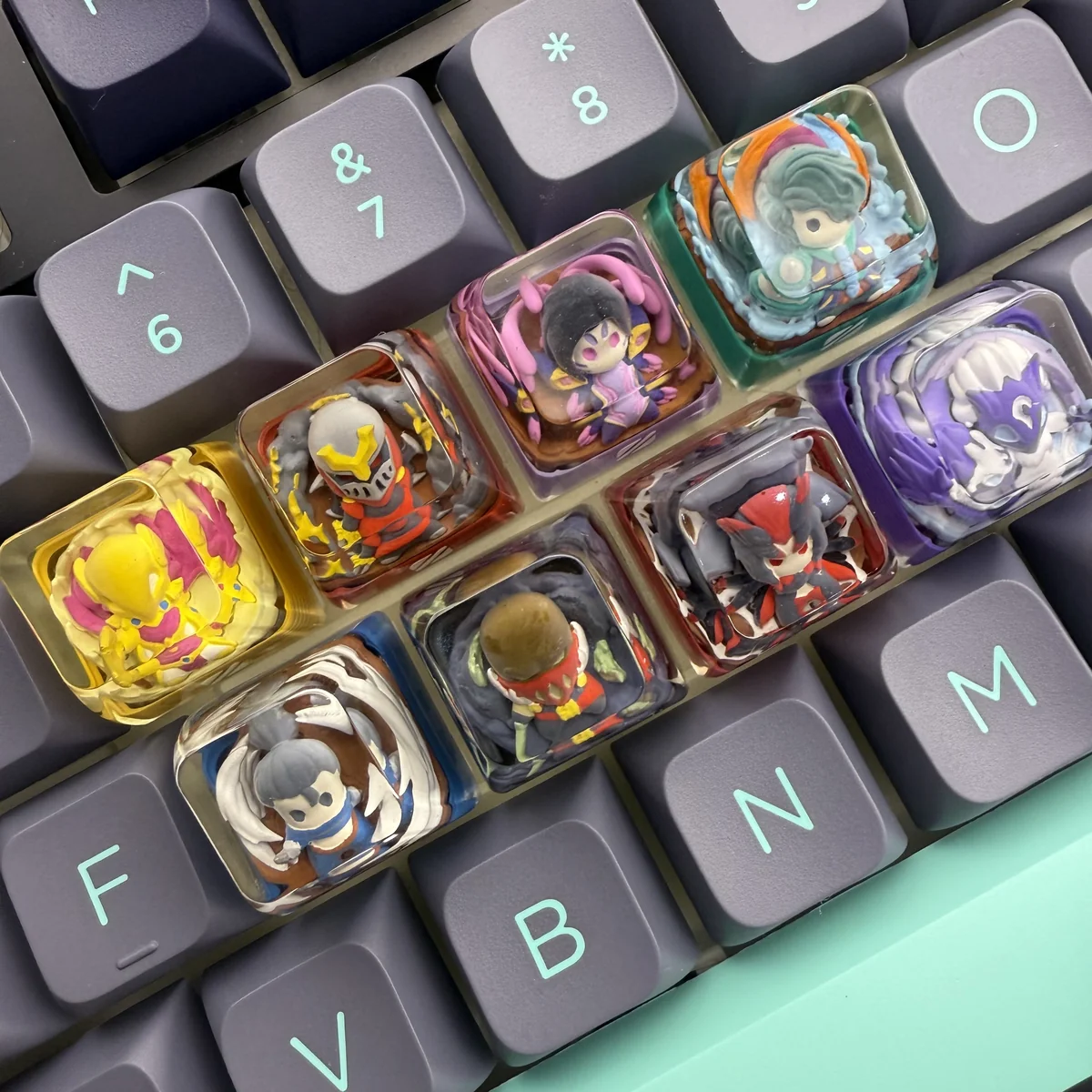 Detailed views of the handcrafted Kindred artisan SA keycap, highlighting its ethereal League of Legends design and translucent resin from various angles.
