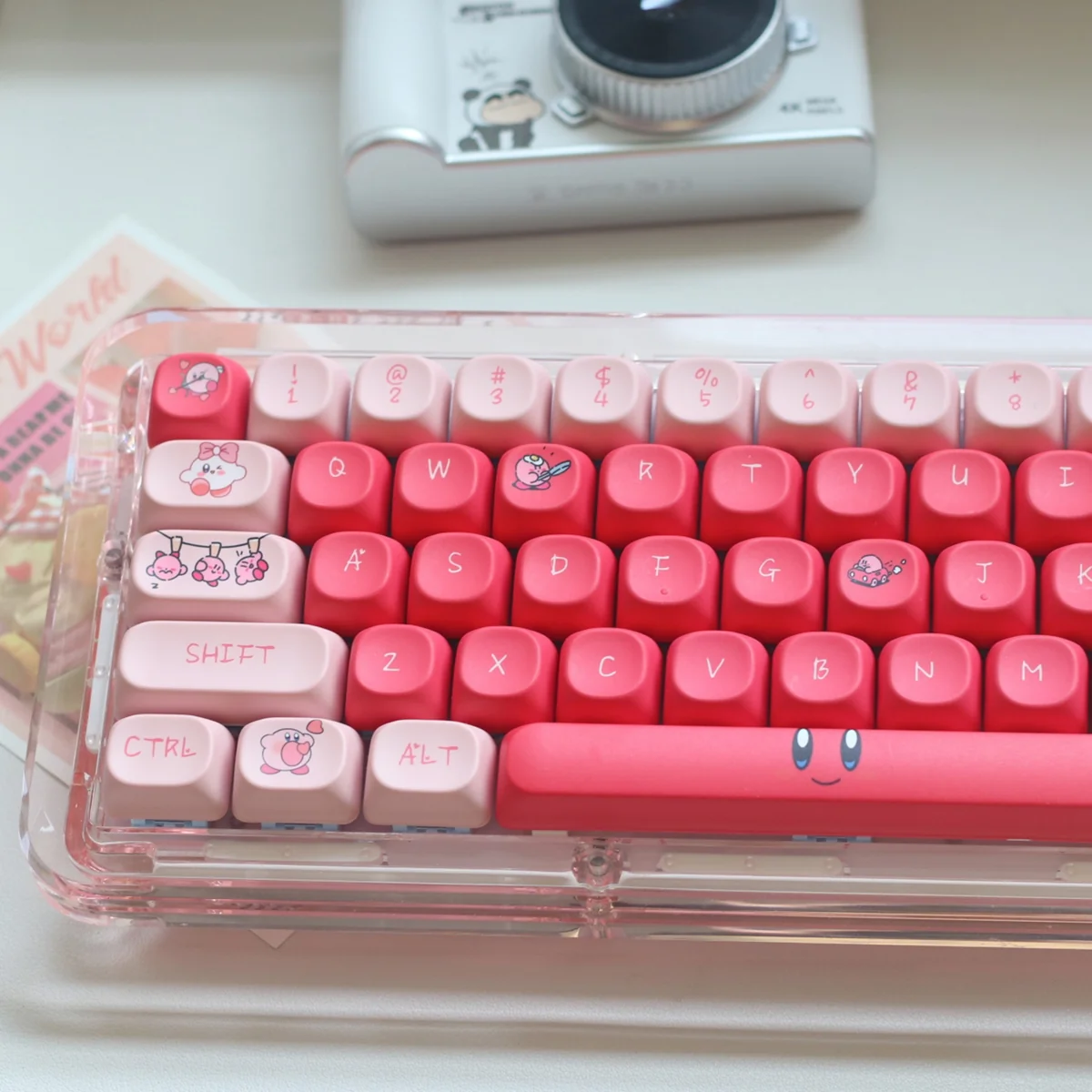 Playful Kirby PBT dye-sub keycaps set showcased from multiple angles, highlighting the vibrant, charming Kirby character art and pastel colors on premium design.
