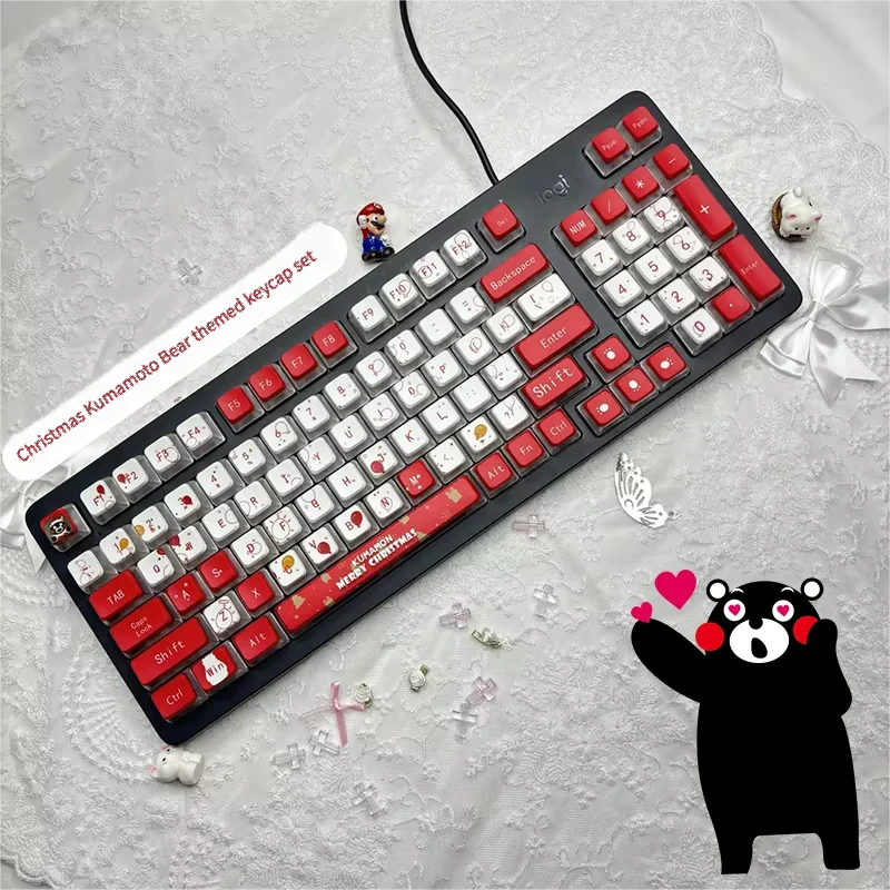 Vibrant Kumamon Christmas PBT keycaps set, showcasing playful festive designs and glowing four-sided RGB translucency from multiple angles.