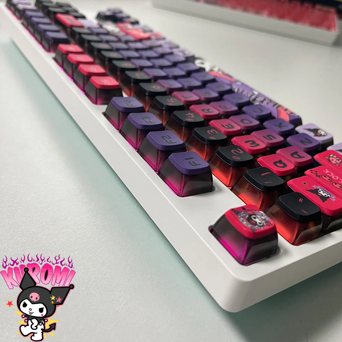 Mischievous Kuromi RGB Pudding Keycaps Set, showcasing iconic designs in vibrant purple/pink. Dazzling RGB glow from a distinct angle.