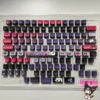 Mischievous Kuromi RGB pudding keycaps set featuring iconic characters in vibrant purple hues, illuminating with a dazzling translucent glow.