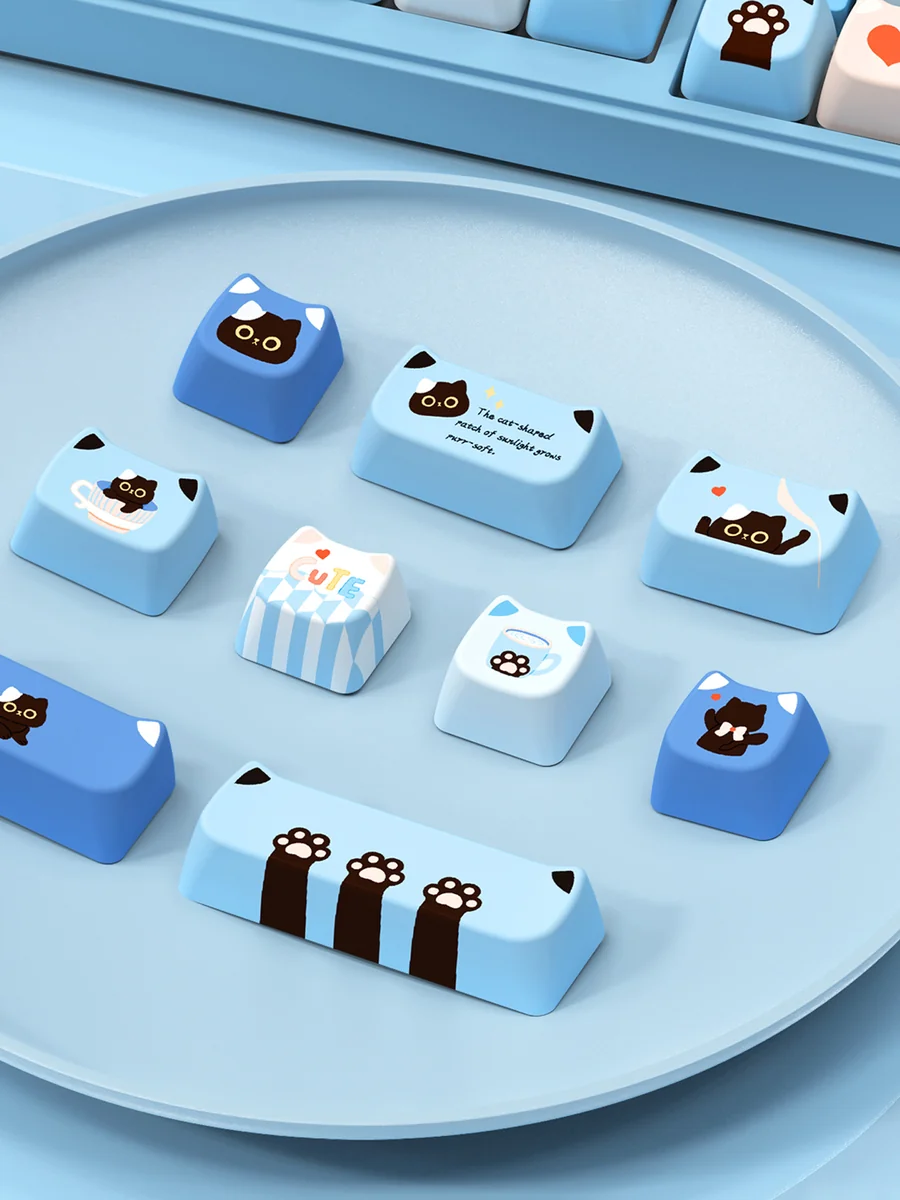 Whimsical Lazy Cat Keycap Set in MAO profile, showcasing its adorable cartoon design and durable PBT material from multiple charming angles.