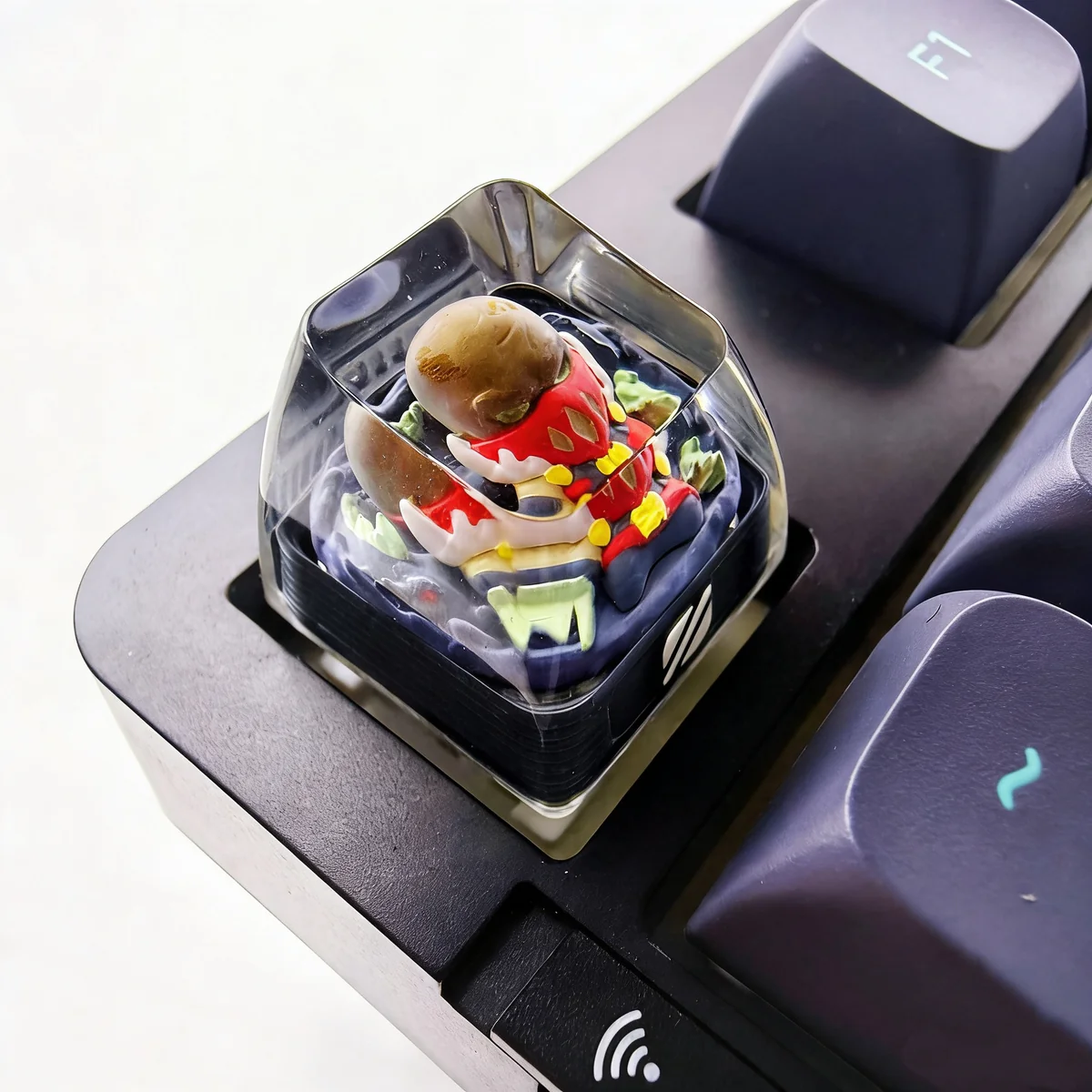 Vibrant handcrafted Pyke League of Legends artisan resin keycap, detailed from multiple angles, highlighting its translucent sculpt for backlit keyboard.