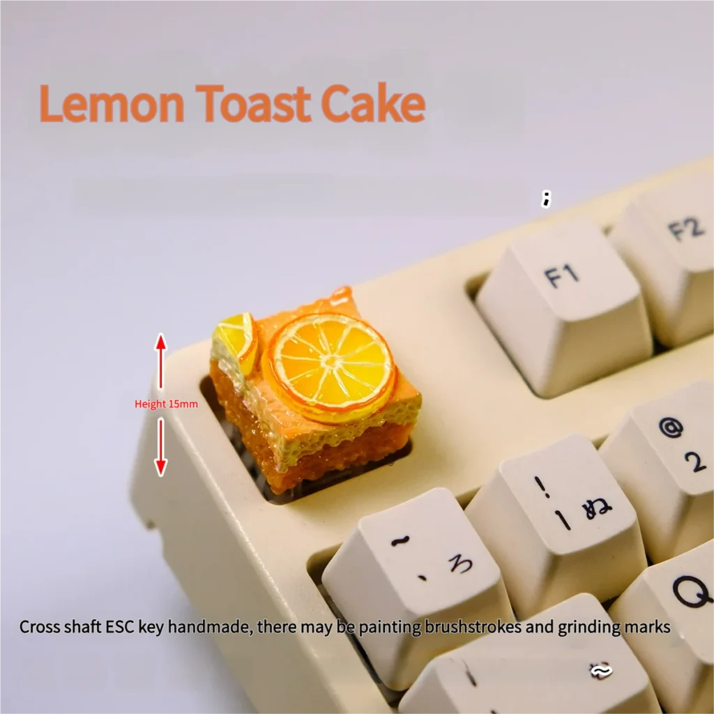 Close-up views of a whimsical handcrafted lemon toast cake artisan keycap, showcasing its delightful miniature details from various angles.