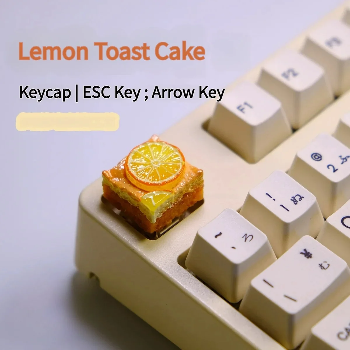 Whimsical handcrafted lemon toast cake artisan keycap, a charming miniature food art piece for keyboards.