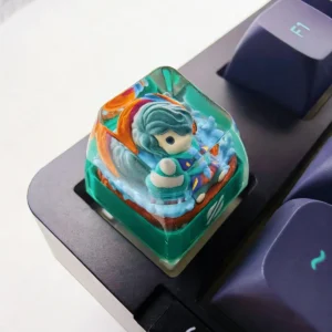 A premium handcrafted resin Hwei LoL artisan keycap, showcasing vibrant, meticulously sculpted character details in translucent resin.