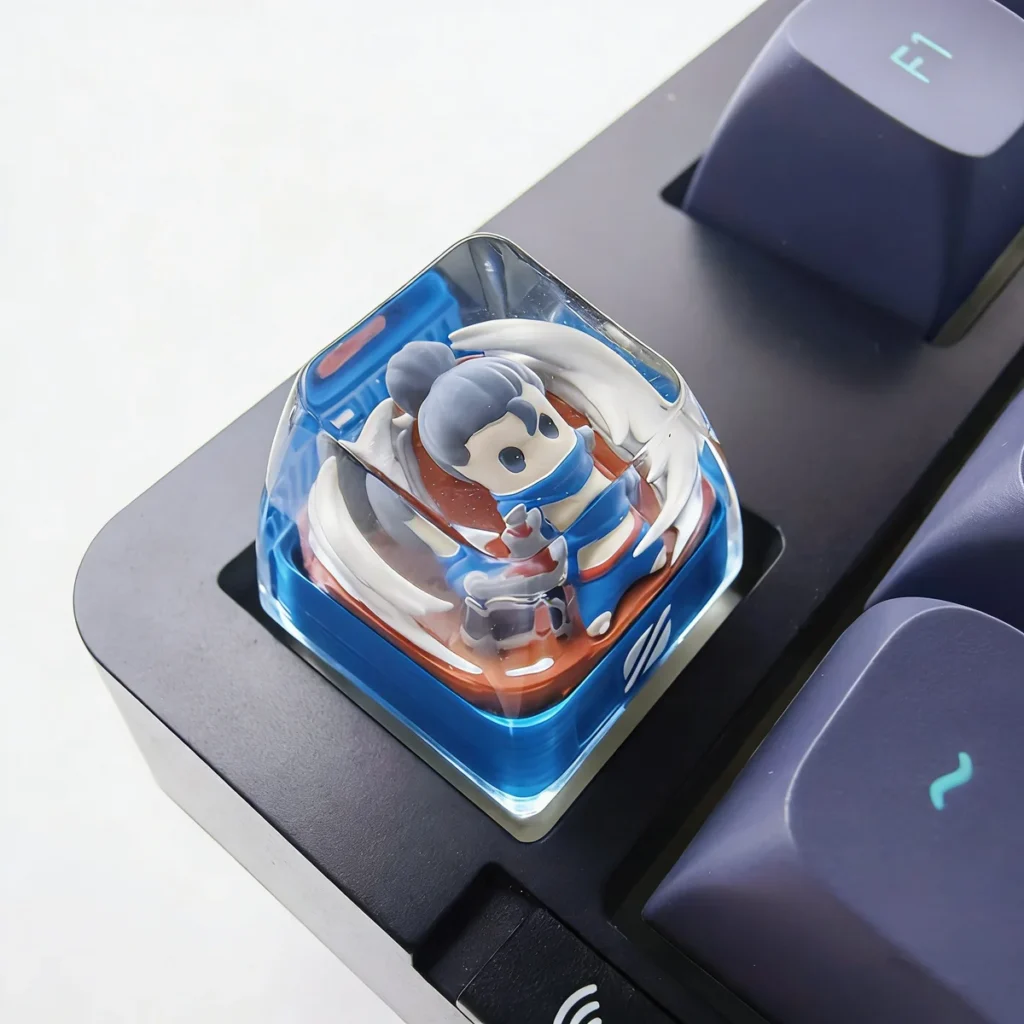 Close-up views of the handcrafted Yasuo LoL keycap, highlighting its intricate resin design, translucent SA profile, and vibrant backlit potential.
