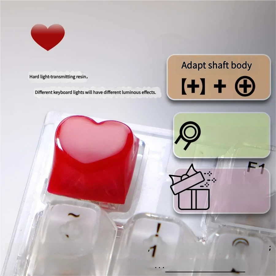 A collection of luminous 3D red heart keycaps from various angles, highlighting their radiant, sculpted design and translucent finish for backlighting design.