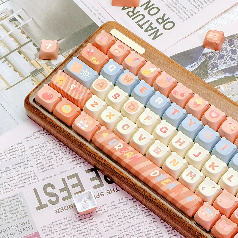 Detailed view of the charming Maillard Bear PBT dye-sub keycaps set, highlighting their unique warm brown hues and cute bear artwork for a playful setup.
