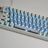 Cute Maltese Dog RGB keycaps set glowing with vibrant light, highlighting their adorable minimalist design and unique 4-sided translucent effect.