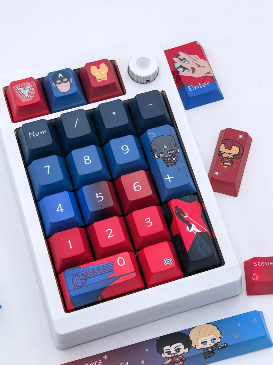 Close-up gallery views of the premium Marvel keycaps set, featuring detailed Iron Man and Captain America designs from multiple angles, showcasing the icon design.