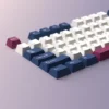 Angled close-up of the Blue Rose Mecha PBT Keycap Set, highlighting its unique design. Intricate futuristic robotics meet elegant blue floral patterns.