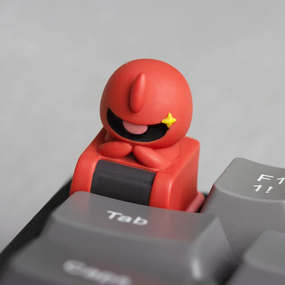 A gallery of handcrafted Chibi Character resin keycaps, showing vibrant stylized mecha art from various artistic angles.