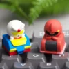 Handcrafted Chibi Character keycap, a vibrant resin mecha art piece, showcasing a stylized Gundam Zaku design.
