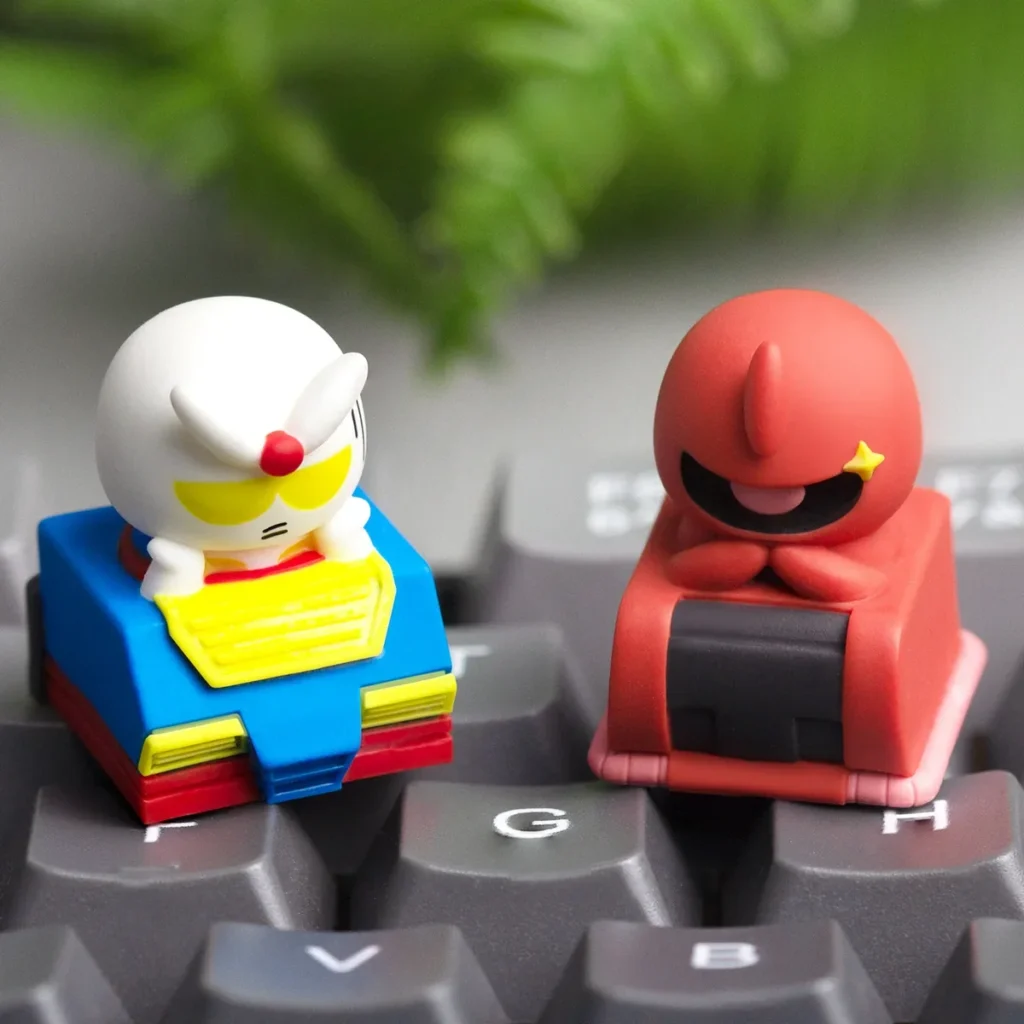 Handcrafted Chibi Character keycap, a vibrant resin mecha art piece, showcasing a stylized Gundam Zaku design.