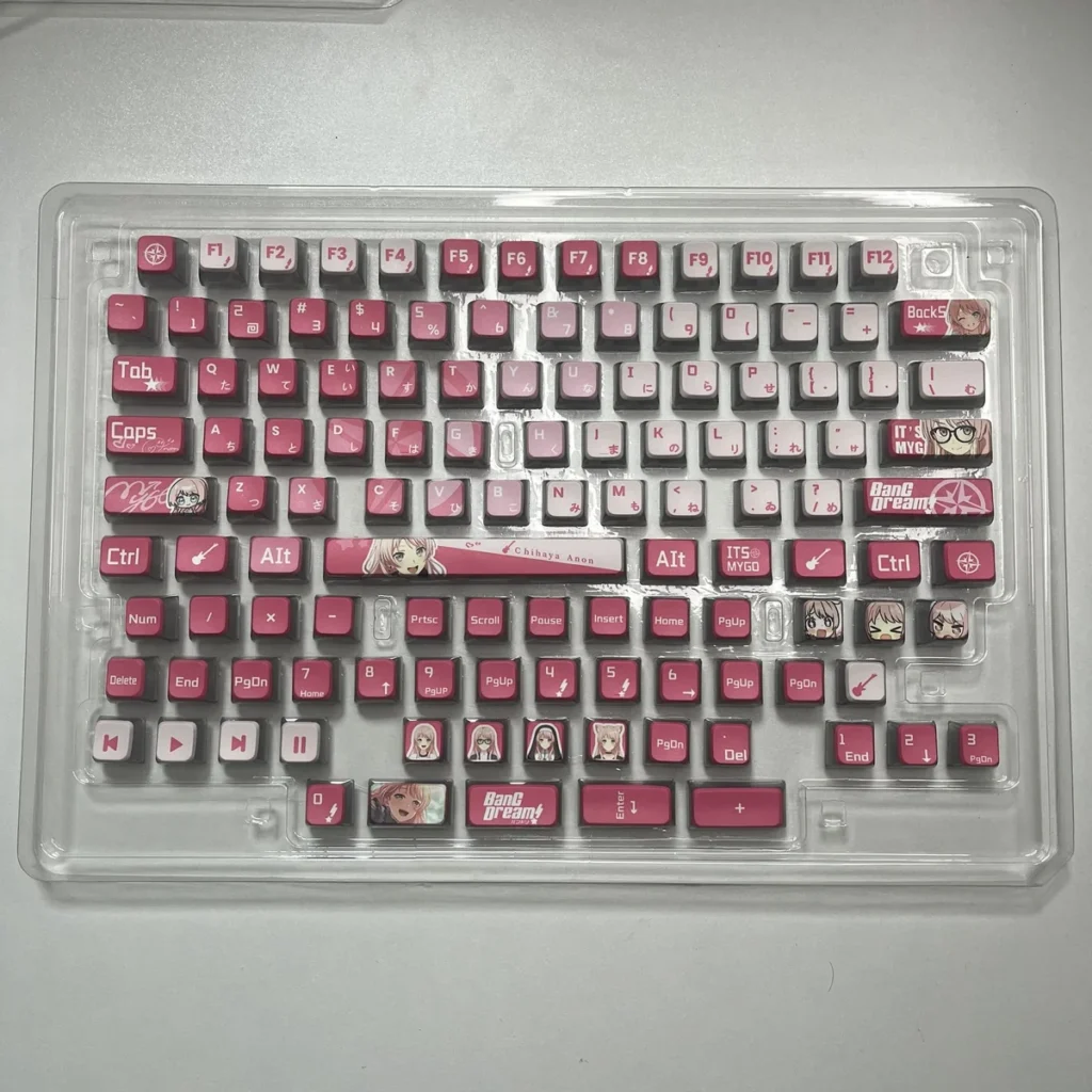 MyGO Chihaya Anon glowing PBT keycaps set displayed from multiple angles, showcasing their exclusive all-sided translucent design and vibrant anime character design.