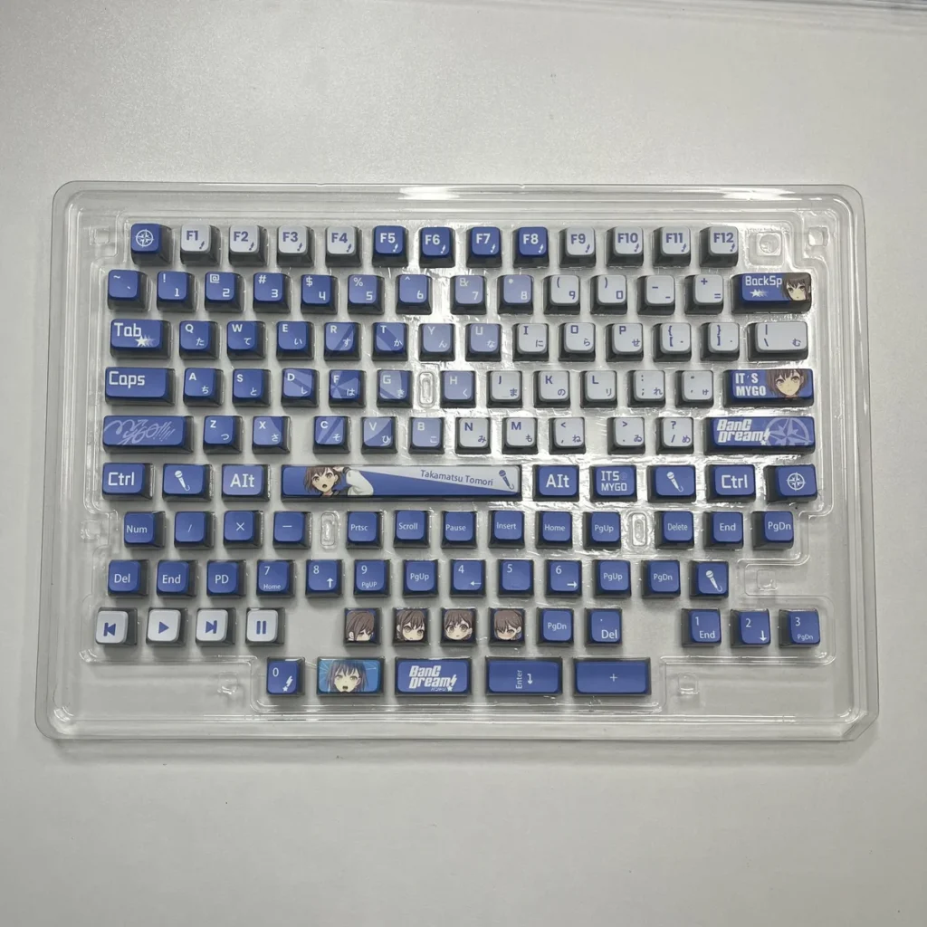 MyGO Tomori translucent PBT keycaps set, anime-themed. Various angles showcase four-sided luminescence, melancholic artistry, and radiant RGB.