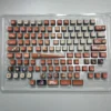 A collection of Nagasaki Soyo PBT four-sided shine-through keycaps set, showcasing vibrant anime art and dynamic RGB lighting from multiple angles.