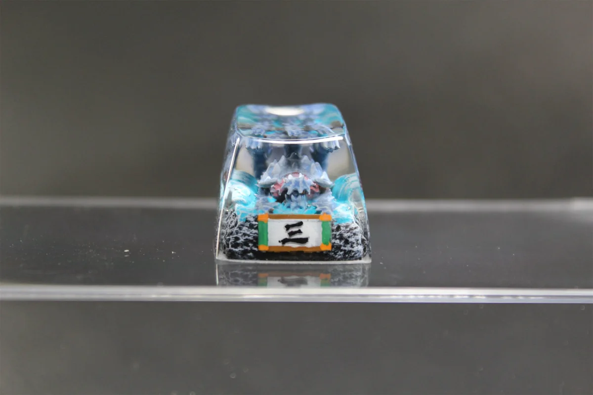 Handcrafted Naruto Isobu Keycap. This vibrant sky-blue resin art depicts the ethereal aquatic Tailed Beast from Naruto lore.