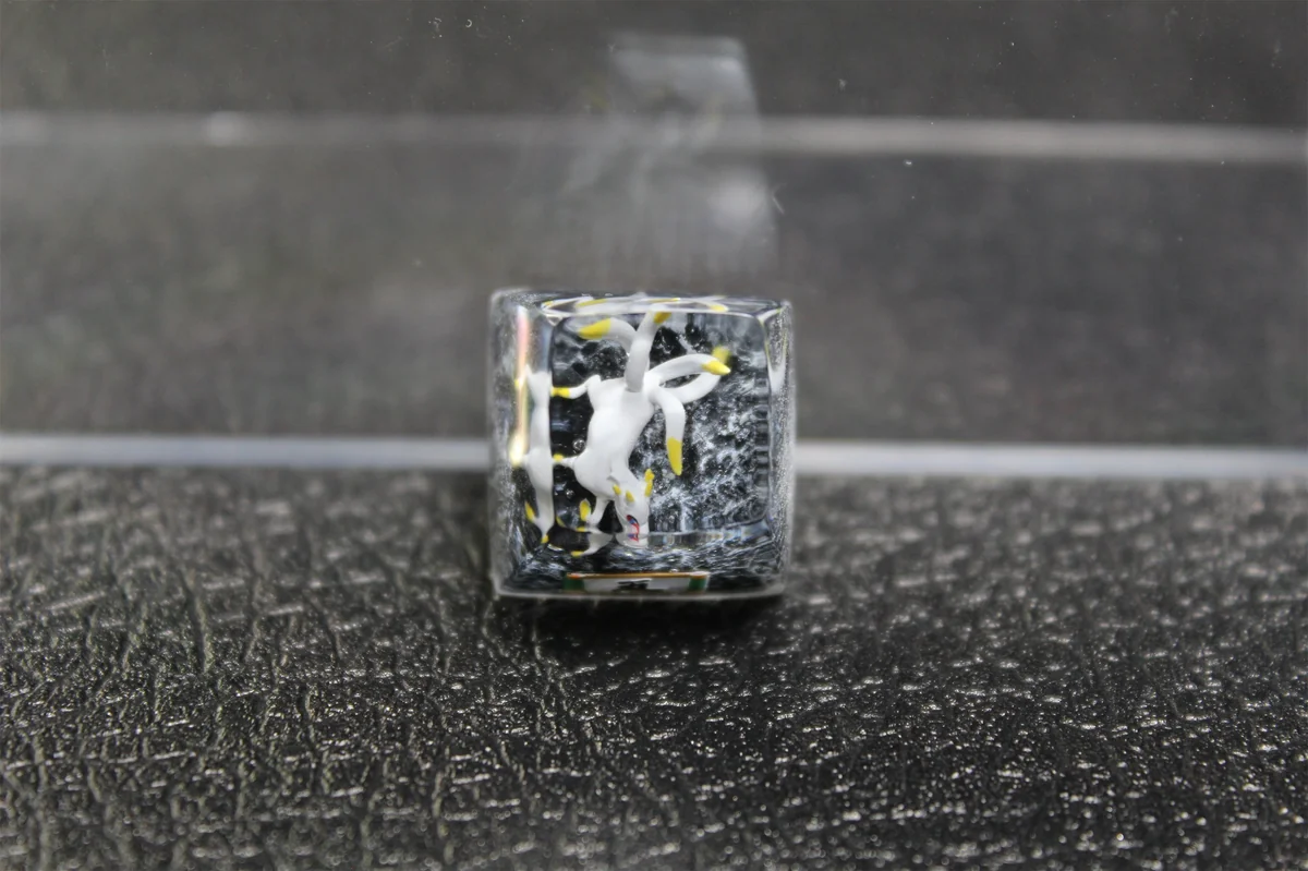 Vibrant handcrafted Naruto Five-Tails artisan keycap. Intricately sculpted mythical beast, resin detail and mythical power from all views.