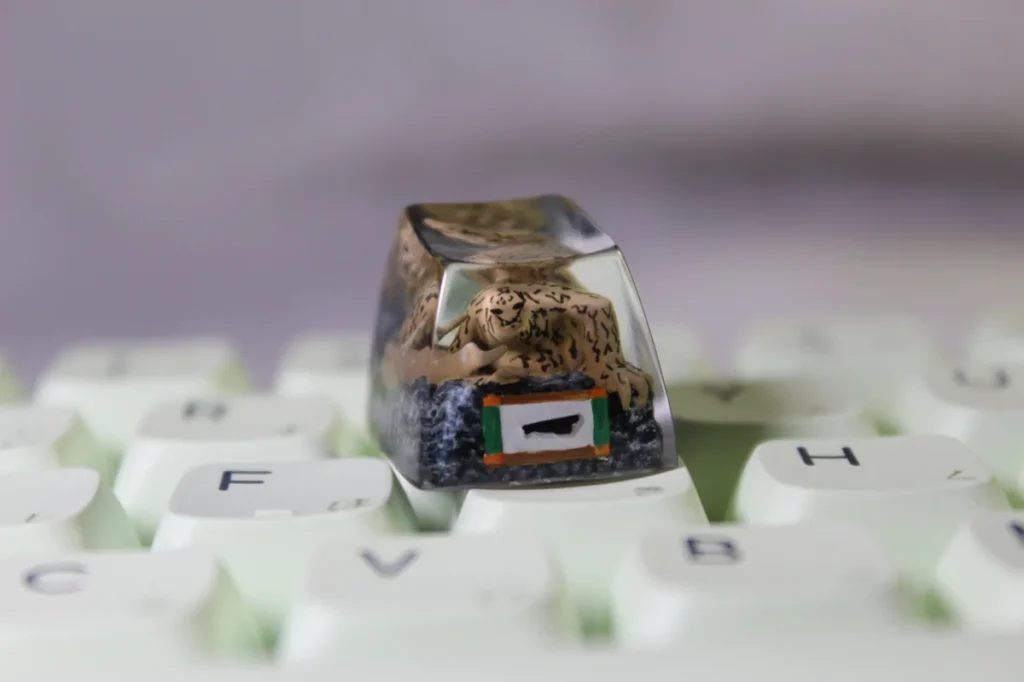Close-up of a premium handcrafted white resin Naruto Shukaku artisan keycap, intricately sculpted with anime-inspired detail.