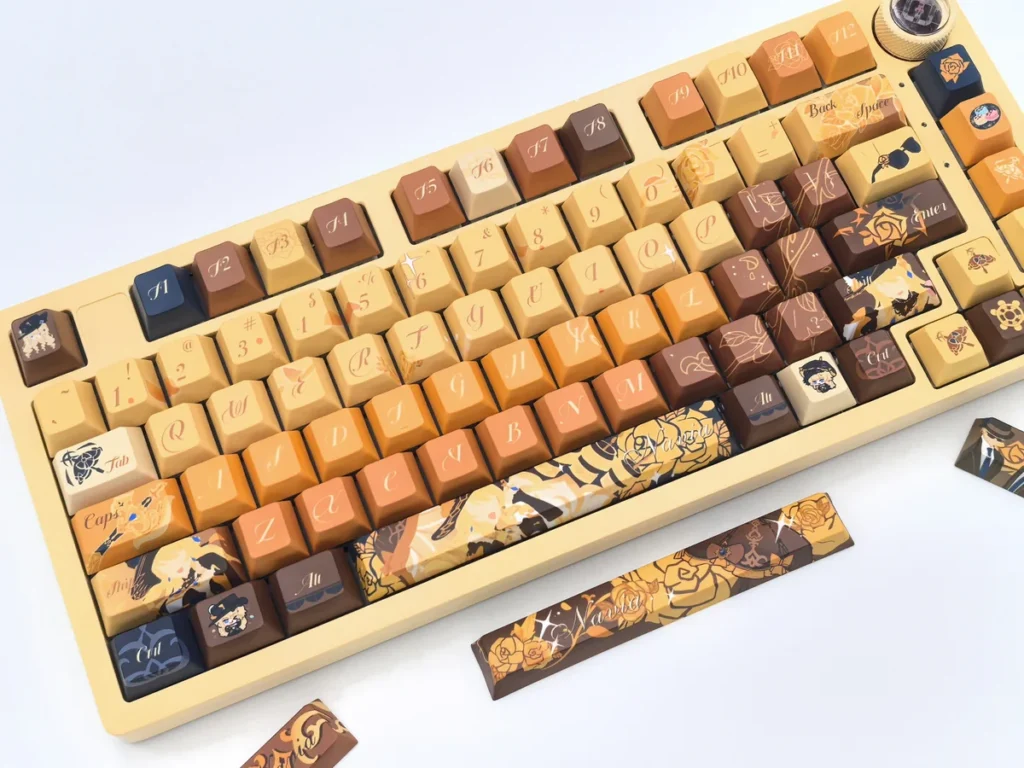 Exclusive Navia Elegance custom mechanical keycaps set featuring elegant amber, gold, and black with intricate rose motifs. A premium Navia-themed set.