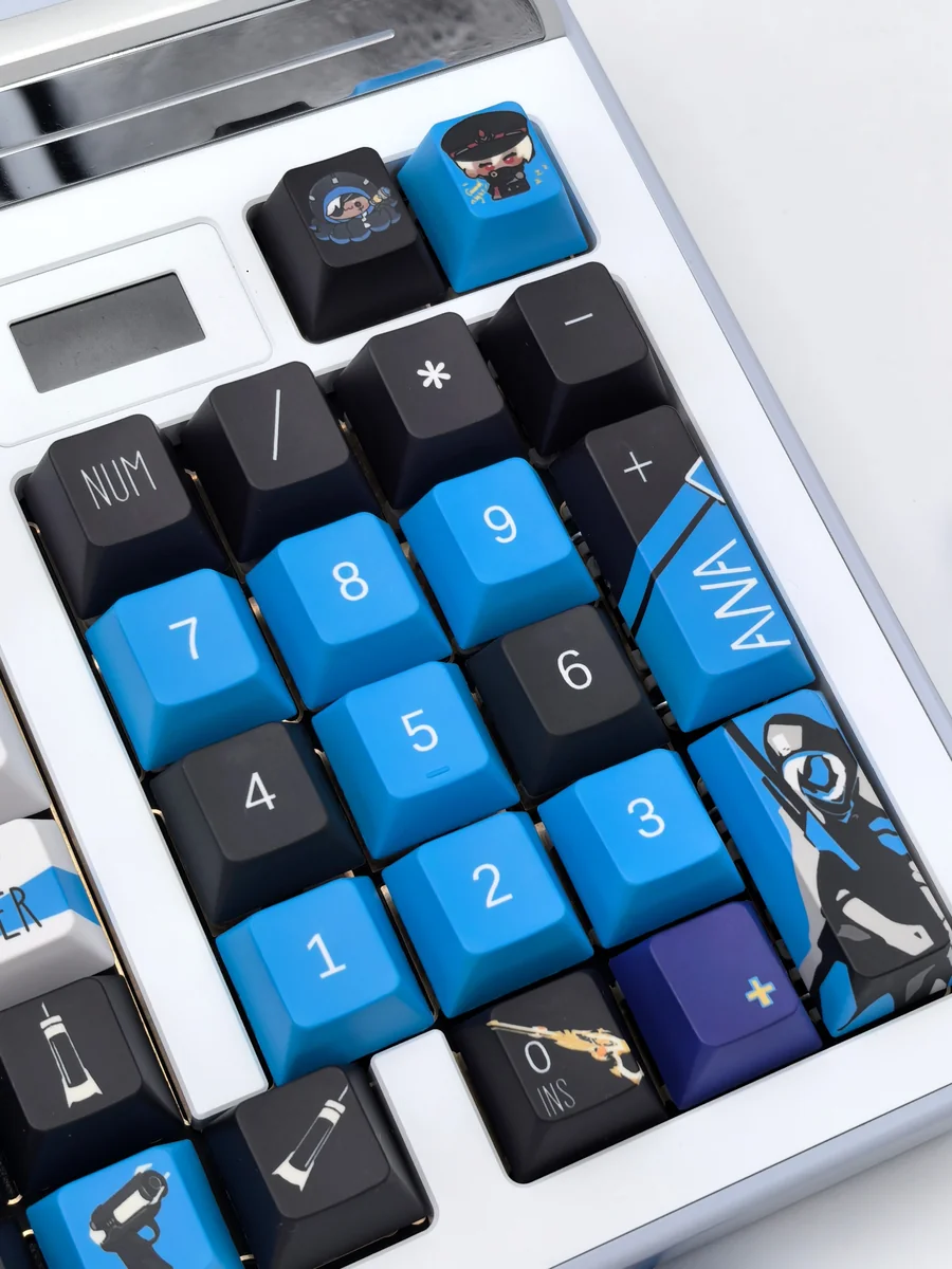 Gallery showcasing the exclusive Overwatch Ana Vigilant Spirit keycap from multiple angles, highlighting its iconic character details and premium craftmanship design.